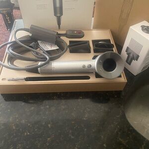 Dyson supersonic Sleek Silver Hair Dryer with Attachments